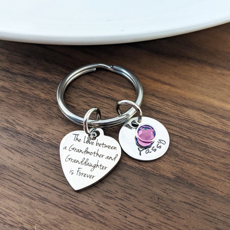 The Love Between A Grandmother and Granddaughter Is Forever Keychain.